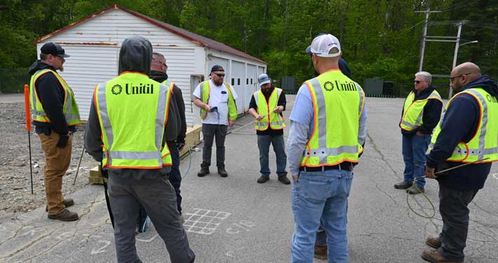 Unitil employees work on Saftey Town