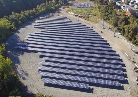 aerial view of Unitil's Solarway location showing multiple rows of solar panels