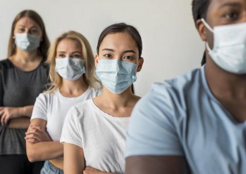 line of people wearing facemasks